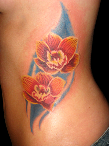 Beautifull Art of Orchid Tattoo in Body