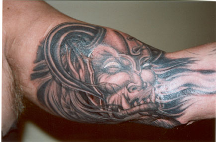 Keyword Galleries Black and Gray Tattoos Biker Tattoos Evil Tattoos