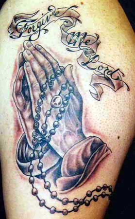 praying hands tattoo. Praying Hands Tattoo