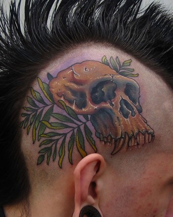 Jon von Glahn - chimp skull fern head tattoo