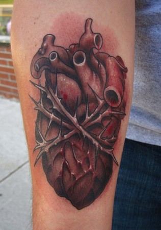 squeezedanatomicalheartblackandgreytattoowithred