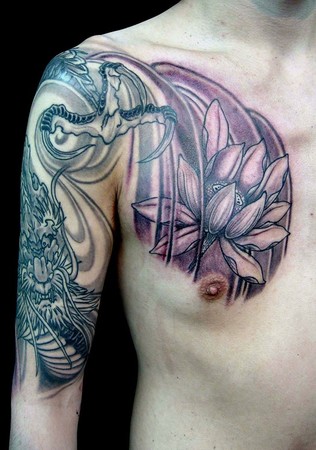 sleeve tattoo black and grey. Dragon/lotus lack and grey