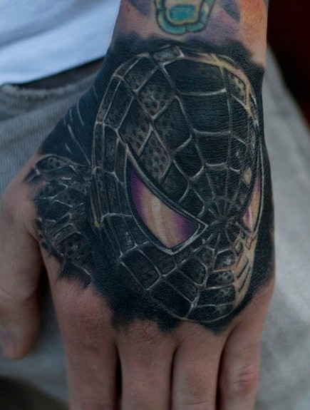 spiderman chest tattoo. Spiderman hand tattoo