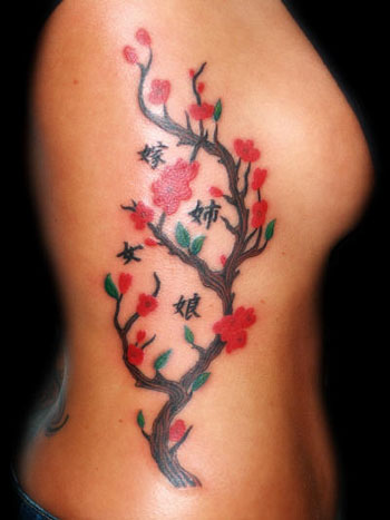 cherry tree blossom tattoo. Cherry blossom tree on ribs