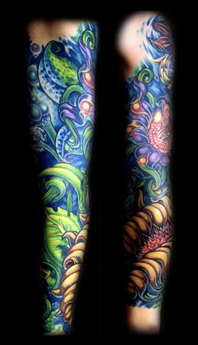 flower sleeve tattoos. flower color arm sleeve tattoo