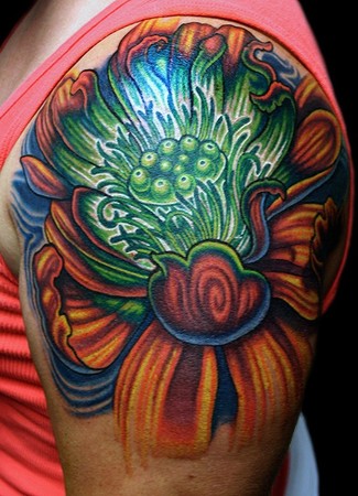 Comments: Lotus Flower on Shoulder with green glow center