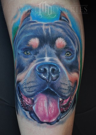 This Pit Bull Tattoo is a portrait of her dog,done on her inner arm.