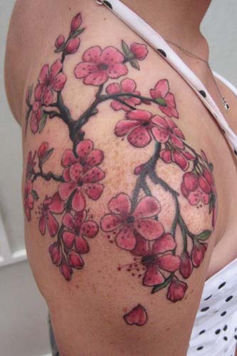 cherry blossom branch tattoo. cherry blossom branches