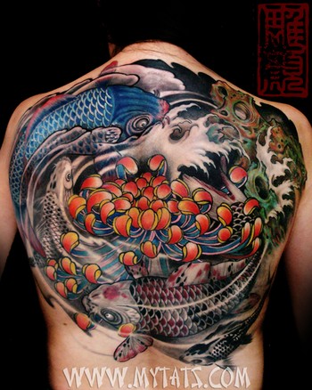 Koi Back Tattoo. Placement: Back Comments: Kois in ying yang circle with