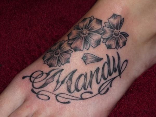 Flowers with script tattoo