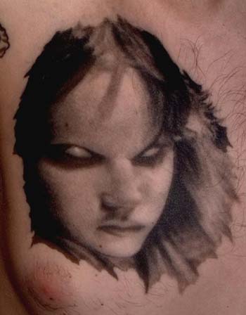Comments: custom black and gray creepy girl portrait tattoo