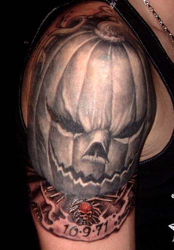 Another wild and unique jackolantern tattoo Love the detail under the