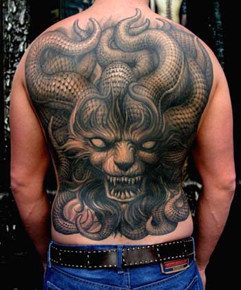 Comments: Tentacle lion black and gray custom tattoo