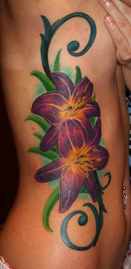 tattoos on side. Phil Young - side flower