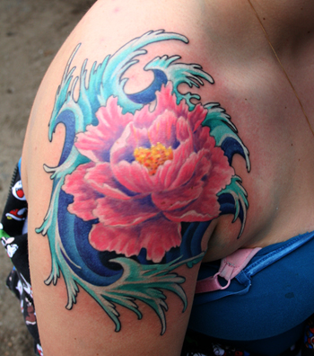 flower3501 japanese wave tattoos. Here's an amazing rib cage tattoo of a 