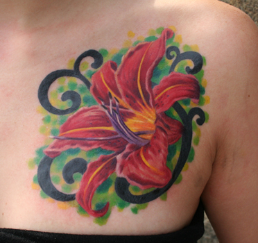 flower lily tattoos. Phil Young - chest lily