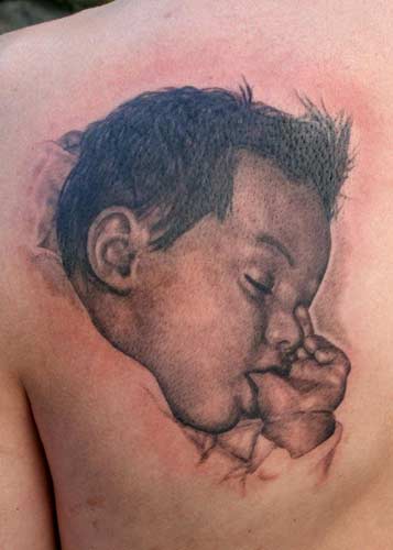 Phil Young Sleeping baby portrait tattoo