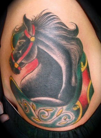 horse with a horse shoe traditional tattoo