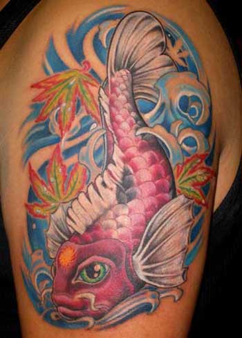 Label: koi tattoo art on arm and thigh