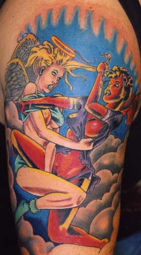 Tattoos Color. Cat fight in the clouds. Now viewing image 33 of 33 previous 