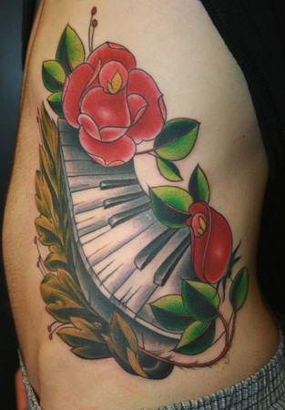 Tattoos. Tattoos Nature. piano keys and roses