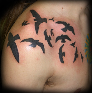 http://www.zhippo.com/SecretLakeTattooHOSTED/images/gallery/black-bird-tattoo-m.JPG