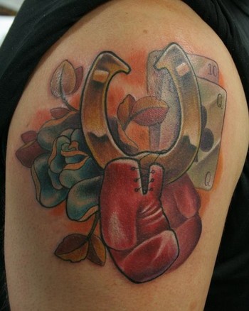 boxing glove tattoo. Horse shoe/oxing gloves.