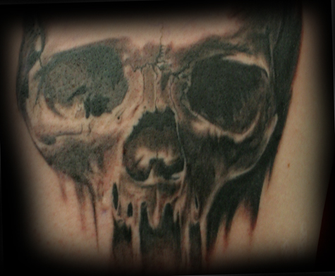 skull tattoo arm. session of a Skull tattoo.