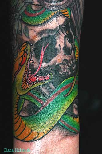 japanese snake tattoos. snake and skull tattoo