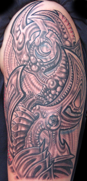 Bio Mechanical tattoo by Seventh Son Tattoo SF Cali Great work
