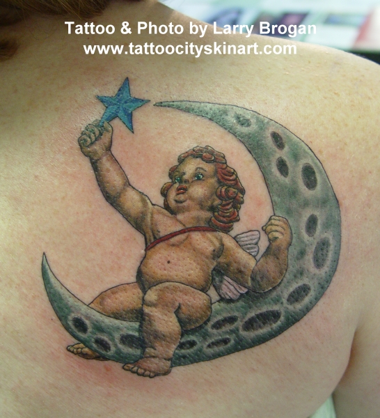  of a cherub standing on a crescent moon so I designed this for her