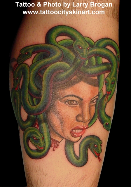 tattoos on head. severed head tattooed at