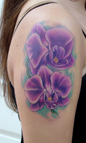 Tattoos Of Orchids. They are purple orchids on