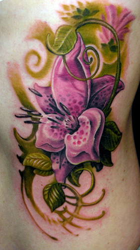 Tattoos Flower Lily tattoos Lilium on ribs click to view large image