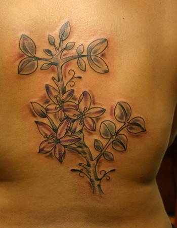Tattoos · Page 1. Jamaican flowers. Now viewing image 47 of 187 previous 