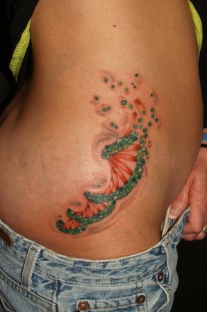 sexy hip tattoos. Sexy Exploding DNA tattoo