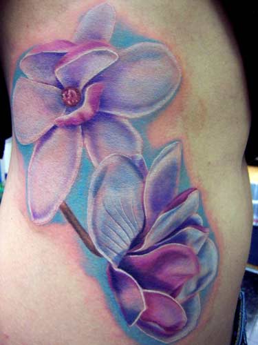 Flower Tattoos On Upper Back. purple tattoo
