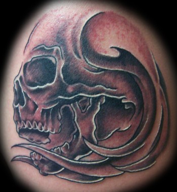 evil skull tattoo. skull-tattoo. The skull is as