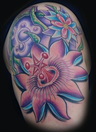 Passion Flower. Placement: Arm Comments: her first big tattoo,