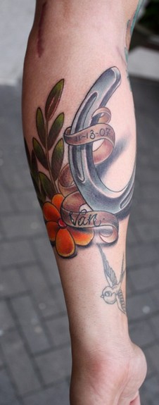 horseshoe tattoo designs. Lizz#39;s elbow tattoo. horseshoe amp; roses! eagle ripping through skin tattoo butterflies tattoos designs