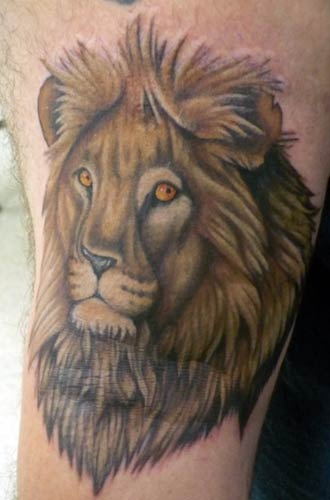 colorful tattoos on black skin. lion tattoos