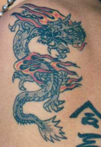  Tatoos on Tattoos   Really Bad Tattoo   Oriental Dragon