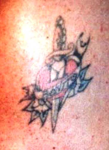 Really bad tattoo's portfolio. Heart and Dagger Placement: Arm.