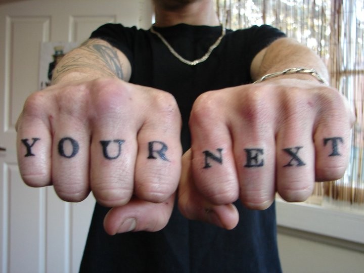 Prior to the advent of the neck tattoo, the knuckle tattoo was the authentic