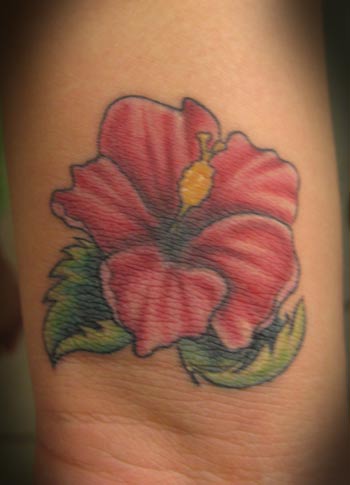 Lil' Hibiscus Placement Arm Comments This piece is a little bigger than a
