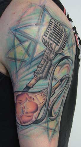 Looking for unique Tattoos? two fetuses and a microphone