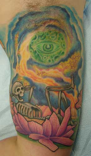 hippie skeleton. Placement: Arm Comments: the inside piece to the oroborus 