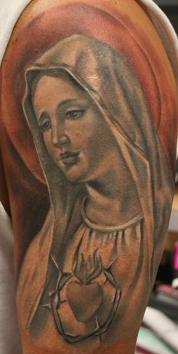 Ahh, the best for last, Princess Leia as the virgin mother Mary, tattoo