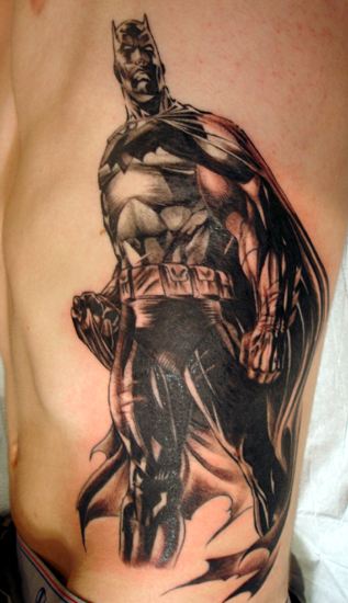Ryan sent in the above Batman tattoos, done by Tilo in Clannad Tattoo