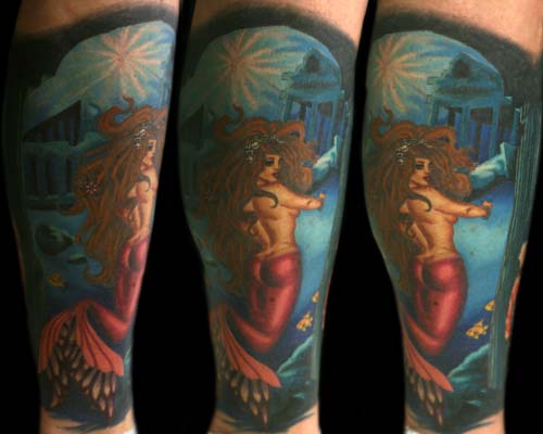 The dolphins and my cover up of her cover up are on the other side.